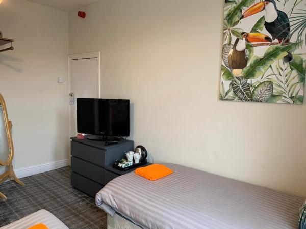 Tropics Beach Hotel : photo 2 de la chambre chambre triple