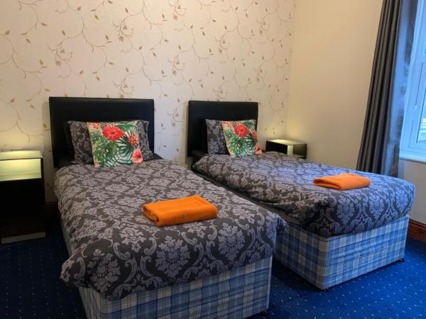 Tropics Beach Hotel : photo 1 de la chambre chambre lits jumeaux standard