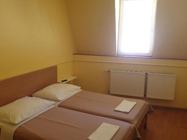 Jáde Panzió : photo 1 de la chambre chambre lits jumeaux avec salle de bains privative