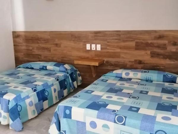 Hotel Villa Mexicana Puerto Escondido : photo 8 de la chambre chambre lits jumeaux standard - vue sur mer