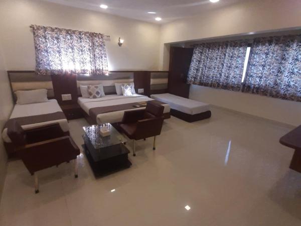 Hotel Golden Palms : photo 6 de la chambre chambre triple deluxe