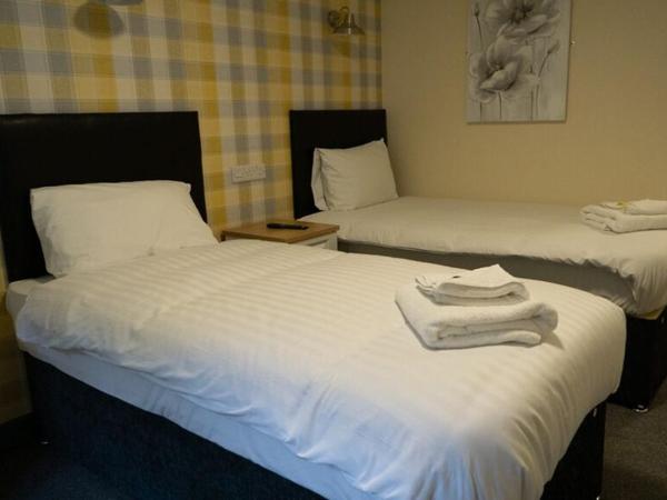 The Aston Inn : photo 2 de la chambre chambre lits jumeaux