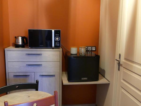 Les Ambaciales : photo 9 de la chambre chambre double ou lits jumeaux avec lit d'appoint