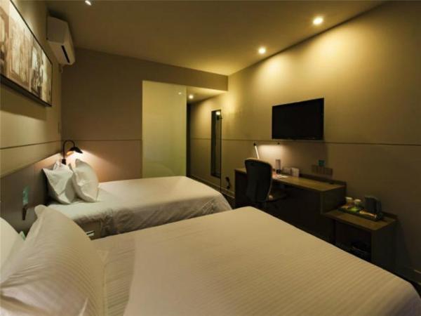 Jinjiang Inn Select Wuxi Nanchang Street Huaqing Bridge Metro Station : photo 1 de la chambre chambre lits jumeaux b