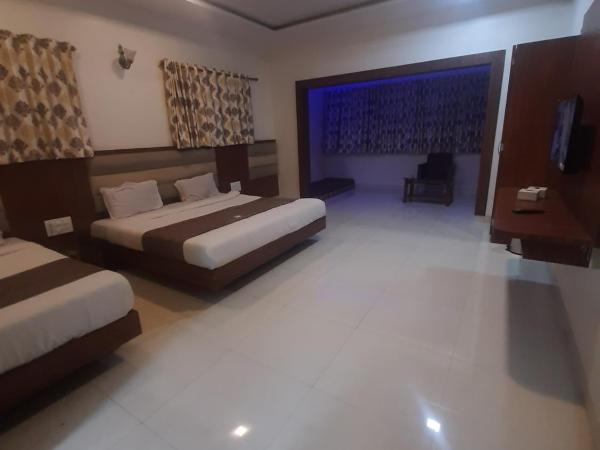 Hotel Golden Palms : photo 4 de la chambre chambre triple deluxe