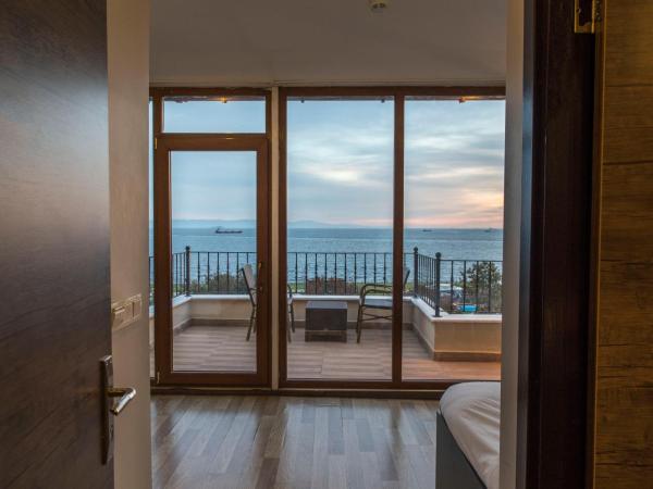 Cheers Lighthouse : photo 3 de la chambre chambre triple supérieure - vue sur mer