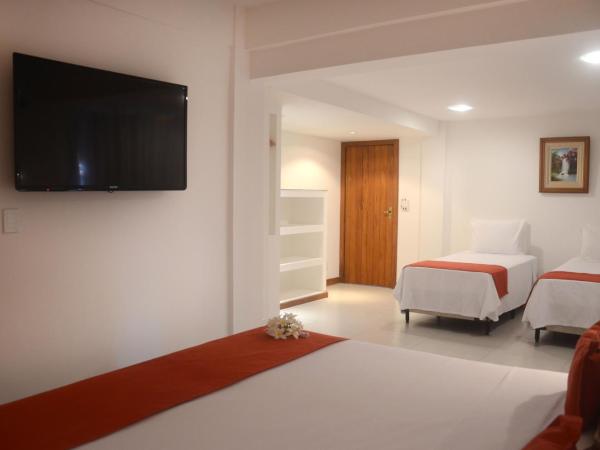 Ilha Branca Exclusive Hotel : photo 2 de la chambre chambre quadruple