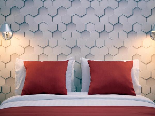 Amazon Hotel : photo 4 de la chambre chambre triple