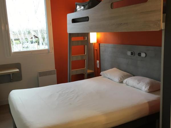 ibis budget Rochefort : photo 2 de la chambre chambre double avec lit superposé