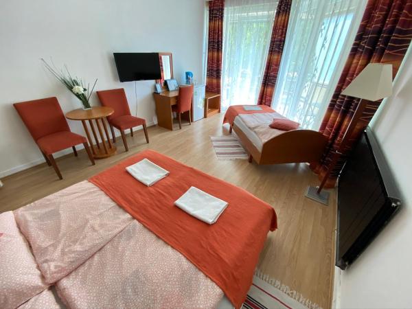 Belvárosi Panzió : photo 3 de la chambre chambre triple