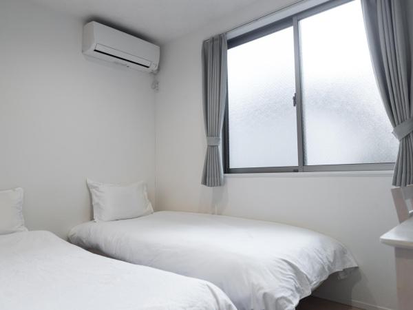nestay inn tokyo senju : photo 2 de la chambre chambre lits jumeaux