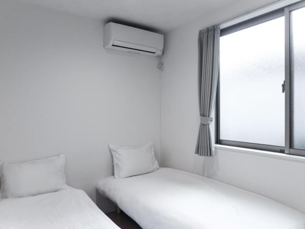 nestay inn tokyo senju : photo 9 de la chambre chambre lits jumeaux