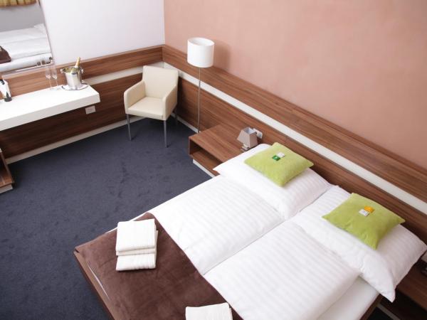 Primus Hotel & Apartments : photo 1 de la chambre chambre double