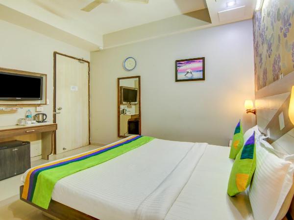 Treebo Rockwell Plaza : photo 2 de la chambre [sanitized] standard double room