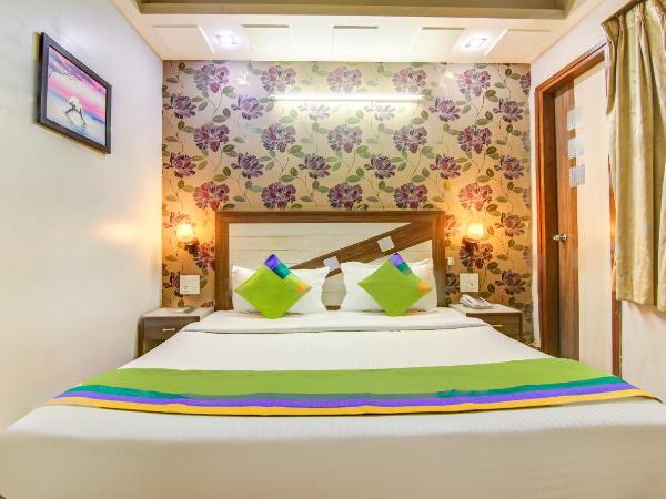 Treebo Rockwell Plaza : photo 4 de la chambre [sanitized] standard double room