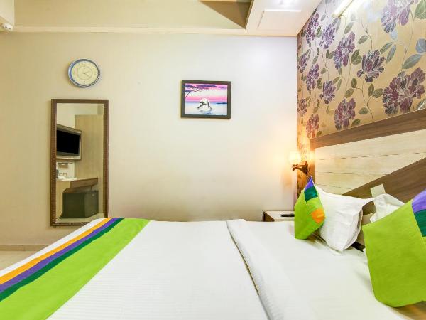Treebo Rockwell Plaza : photo 7 de la chambre [sanitized] standard double room