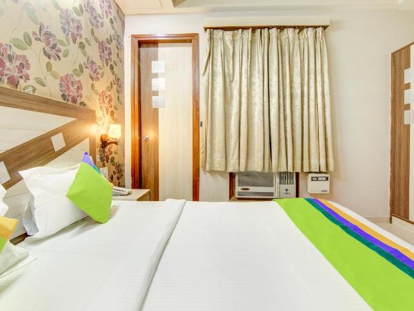 Treebo Rockwell Plaza : photo 8 de la chambre [sanitized] standard double room
