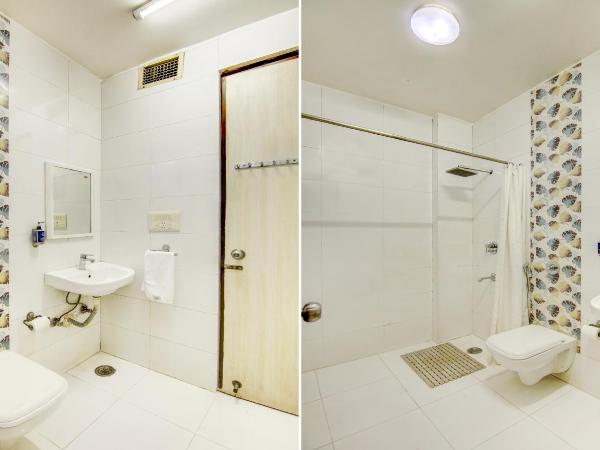 Treebo Rockwell Plaza : photo 5 de la chambre [sanitized] deluxe double room