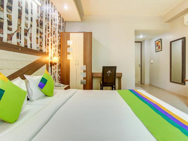 Treebo Rockwell Plaza : photo 2 de la chambre [sanitized] deluxe double room