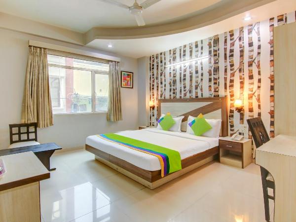 Treebo Rockwell Plaza : photo 1 de la chambre [sanitized] deluxe double room