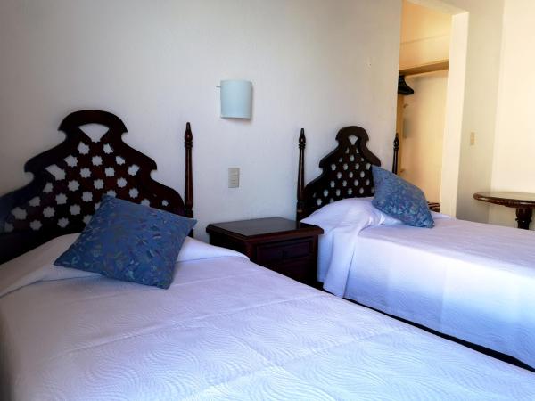 Hotel El Pescador : photo 6 de la chambre chambre double standard avec 2 lits doubles