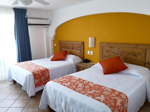 Hotel El Pescador : photo 9 de la chambre chambre double avec 2 lits doubles - vue sur océan