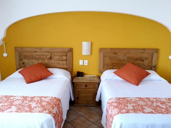 Hotel El Pescador : photo 6 de la chambre chambre double avec 2 lits doubles - vue sur océan