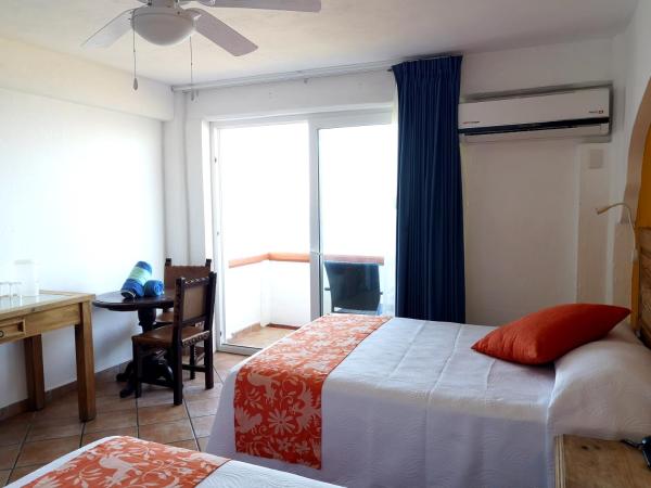 Hotel El Pescador : photo 4 de la chambre chambre double avec 2 lits doubles - vue sur océan