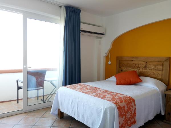 Hotel El Pescador : photo 3 de la chambre chambre double avec 2 lits doubles - vue sur océan