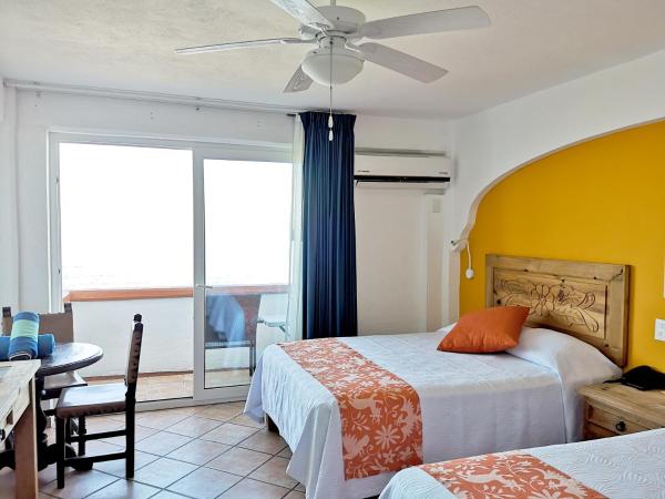 Hotel El Pescador : photo 2 de la chambre chambre double avec 2 lits doubles - vue sur océan