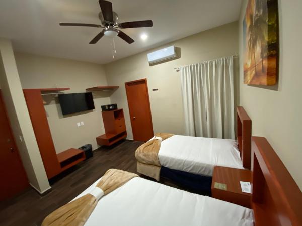 La Lola Hotel & Suites : photo 3 de la chambre chambre double