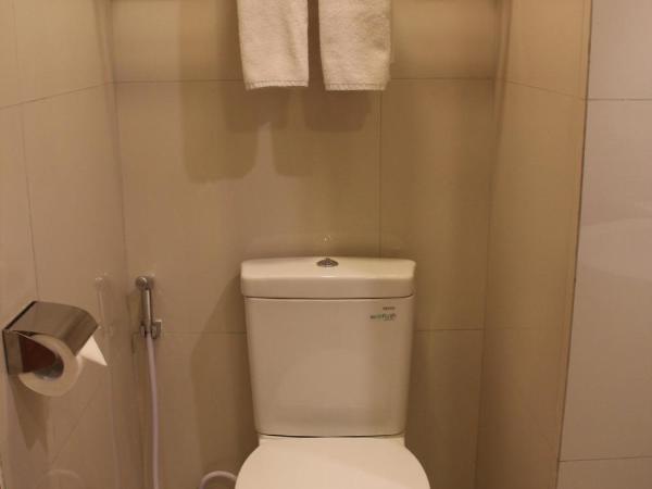 Swiss-Belinn Manyar : photo 9 de la chambre chambre lits jumeaux deluxe