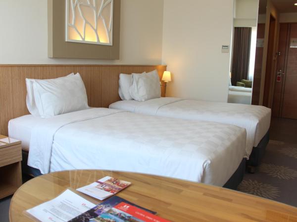 Swiss-Belinn Manyar : photo 6 de la chambre chambre lits jumeaux deluxe