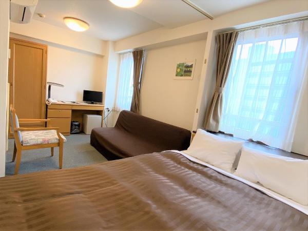 Sakura Hotel Hatagaya : photo 1 de la chambre chambre d'angle double