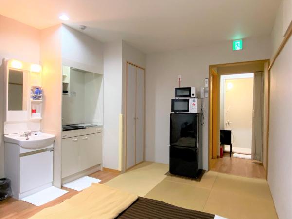 Sakura Hotel Hatagaya : photo 3 de la chambre chambre quadruple de style japonais
