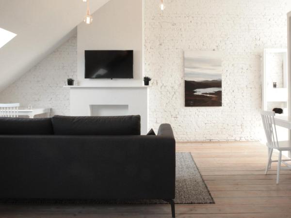 Maison Nationale City Flats & Suites : photo 1 de la chambre suite penthouse