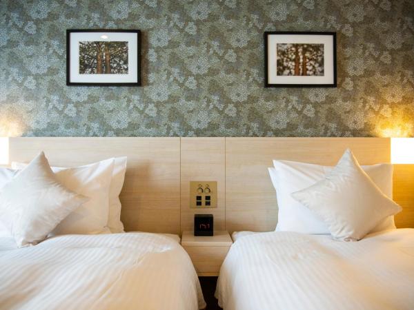 KOKO HOTEL Sapporo Odori : photo 4 de la chambre chambre lits jumeaux supérieure