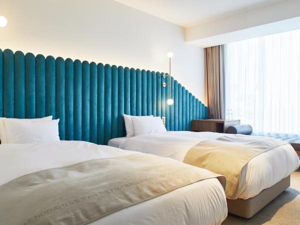 THE KNOT HIROSHIMA : photo 1 de la chambre chambre lits jumeaux supérieure - vue sur ville