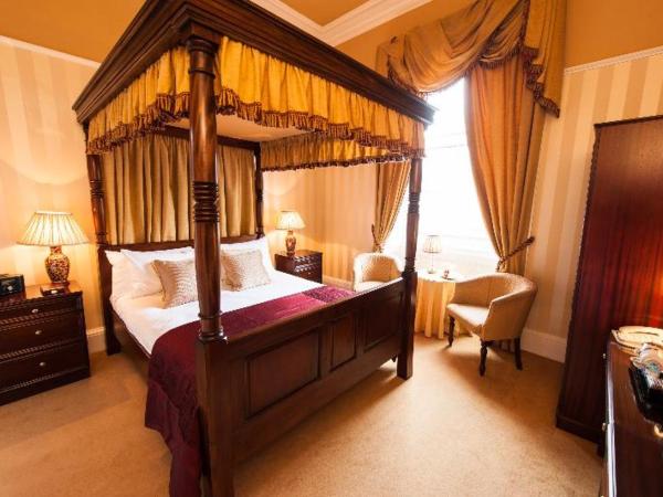 Kildonan Lodge Hotel : photo 2 de la chambre chambre supérieure avec lit à baldaquin