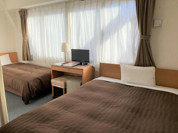Sakura Hotel Hatagaya : photo 3 de la chambre chambre lits jumeaux