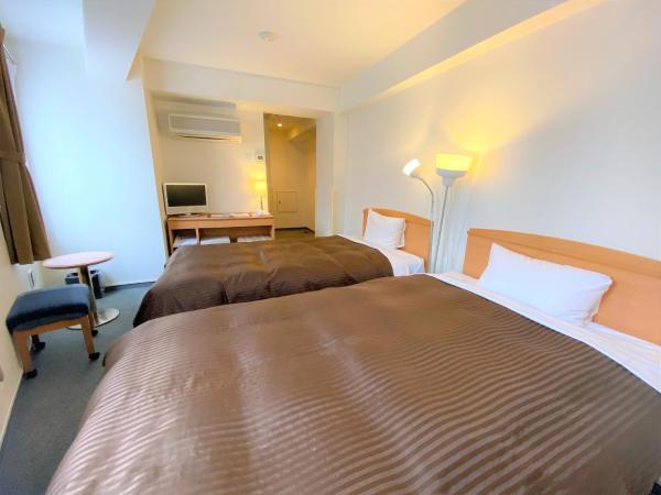 Sakura Hotel Hatagaya : photo 1 de la chambre chambre quadruple