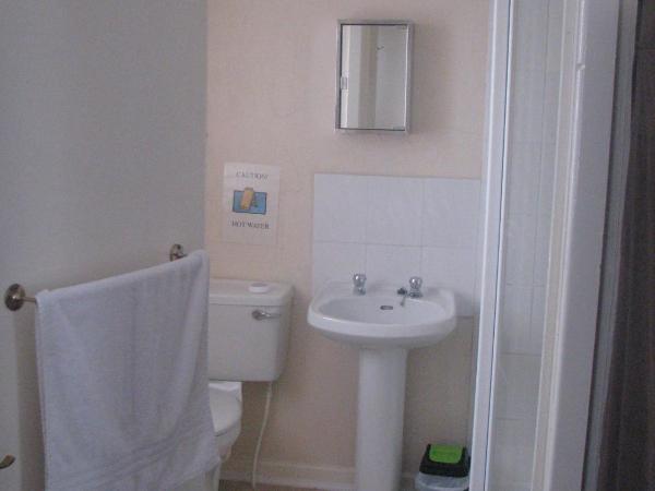 MyRoomz New Discovery Hotel : photo 2 de la chambre chambre quadruple avec salle de bains privative