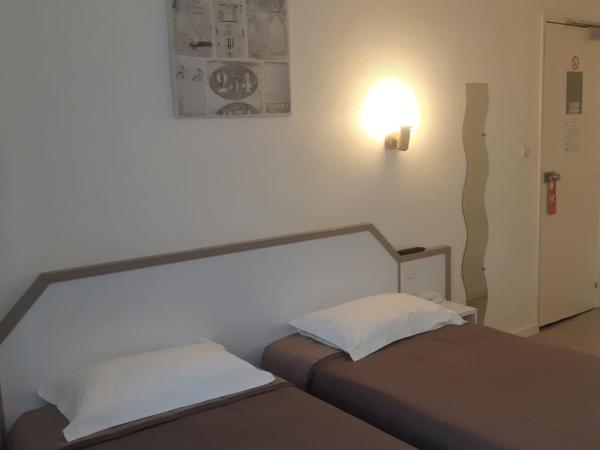 Hôtel de La Croix de Malte : photo 4 de la chambre chambre lits jumeaux