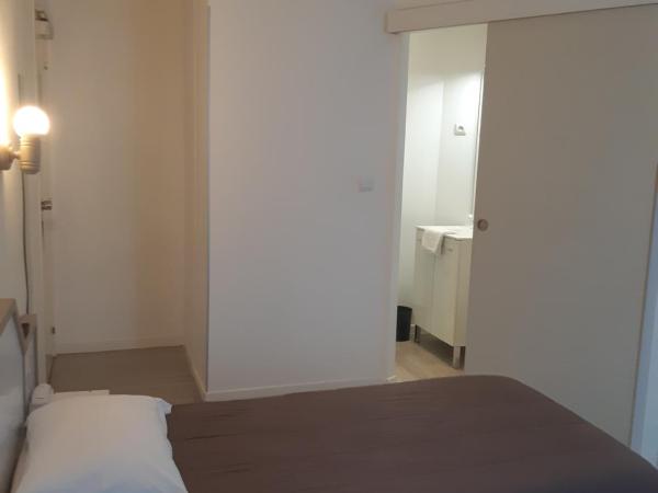 Hôtel de La Croix de Malte : photo 3 de la chambre chambre lits jumeaux