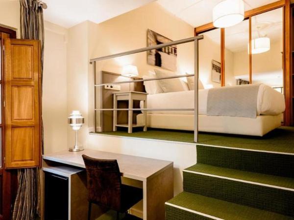 Ikonik Plaza Mercado : photo 2 de la chambre room #1270324