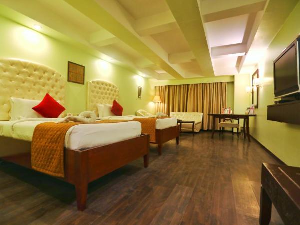 Quality Inn Sabari : photo 1 de la chambre chambre deluxe double ou lits jumeaux