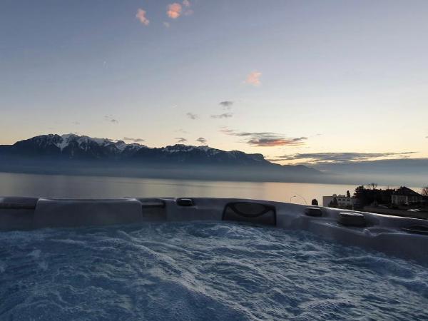 B&B Corseaux Beach & Riviera Beach : photo 10 de la chambre corseaux beach | chambre double supérieure avec baignoire - vue sur lac