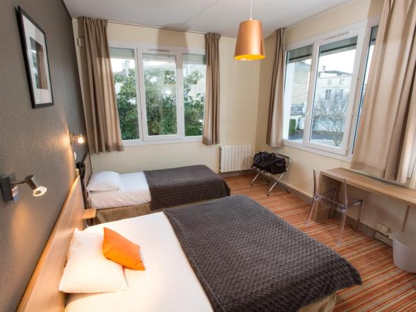 Brit Hôtel du Parc Niort Centre-Parking gratuit : photo 5 de la chambre chambre lits jumeaux