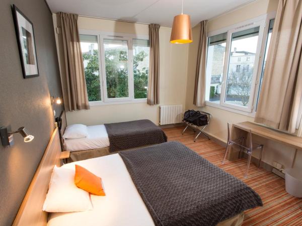 Brit Htel du Parc Niort Centre-Parking gratuit : photo 1 de la chambre chambre lits jumeaux