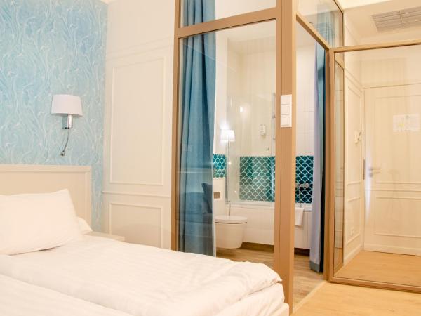 Hotel Villa Baltica : photo 4 de la chambre chambre double ou lits jumeaux